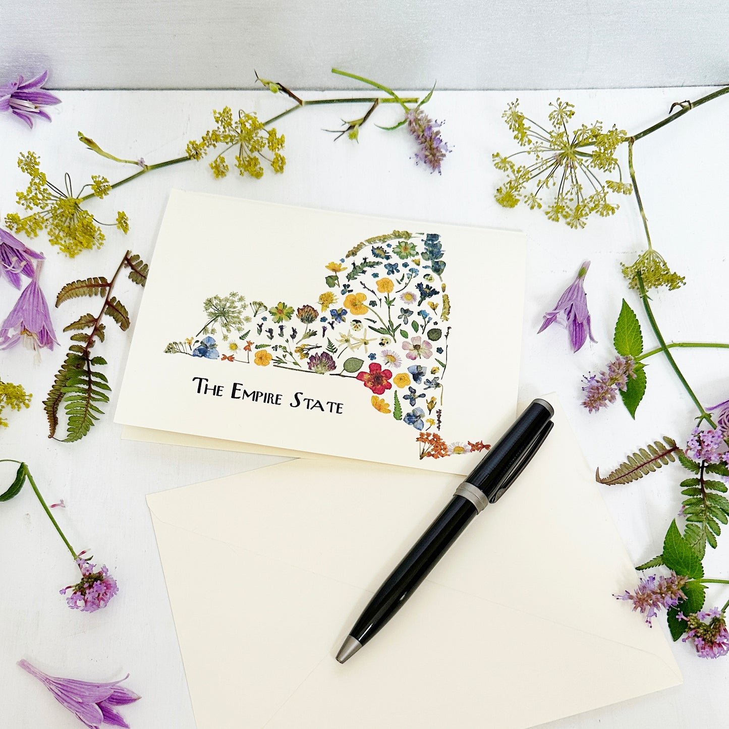 The Empire State greeting card - New York State map in printed pressed wild flowers