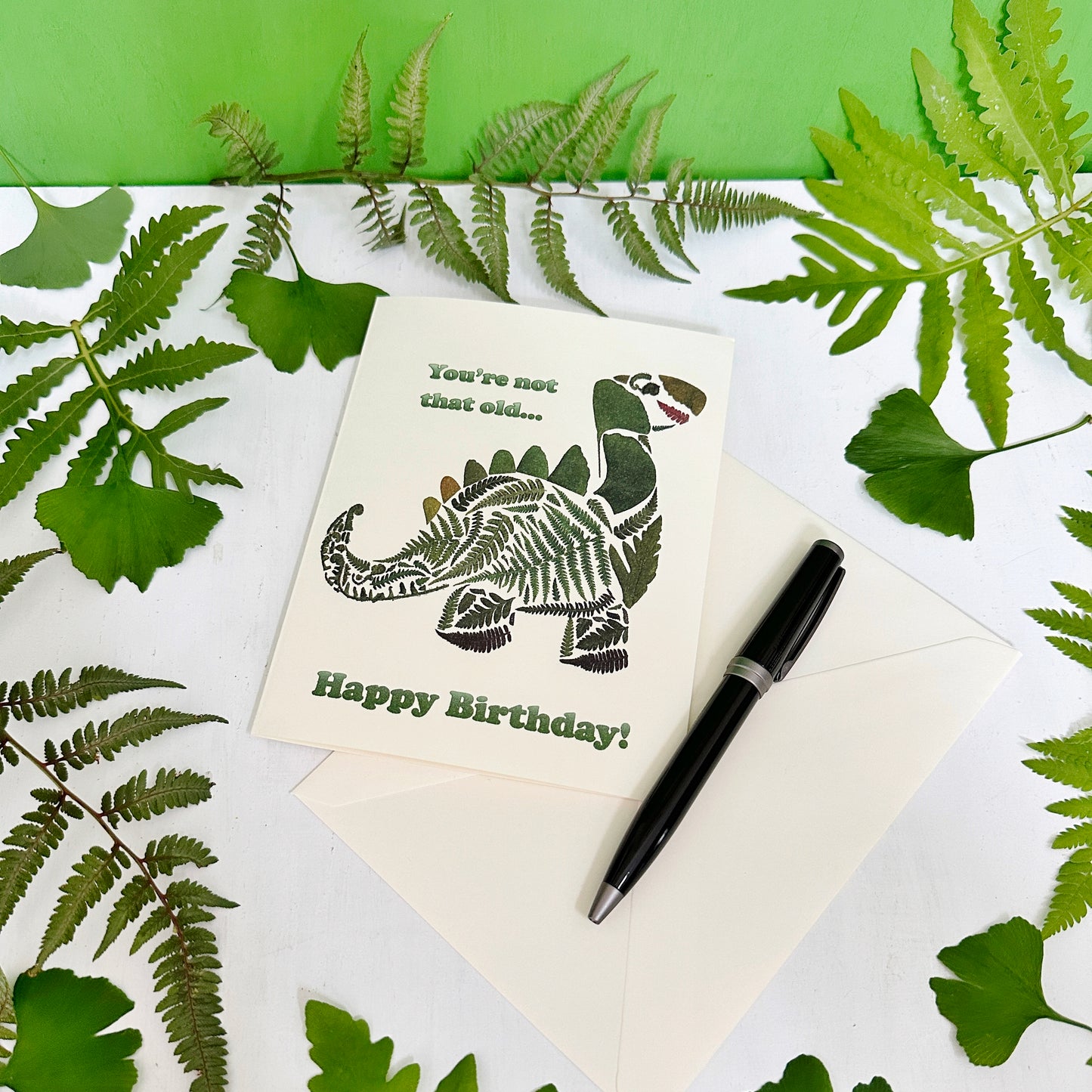 Dinosaur Birthday Card - printed real pressed fern and ginkgo leaves in a dinosaur shape