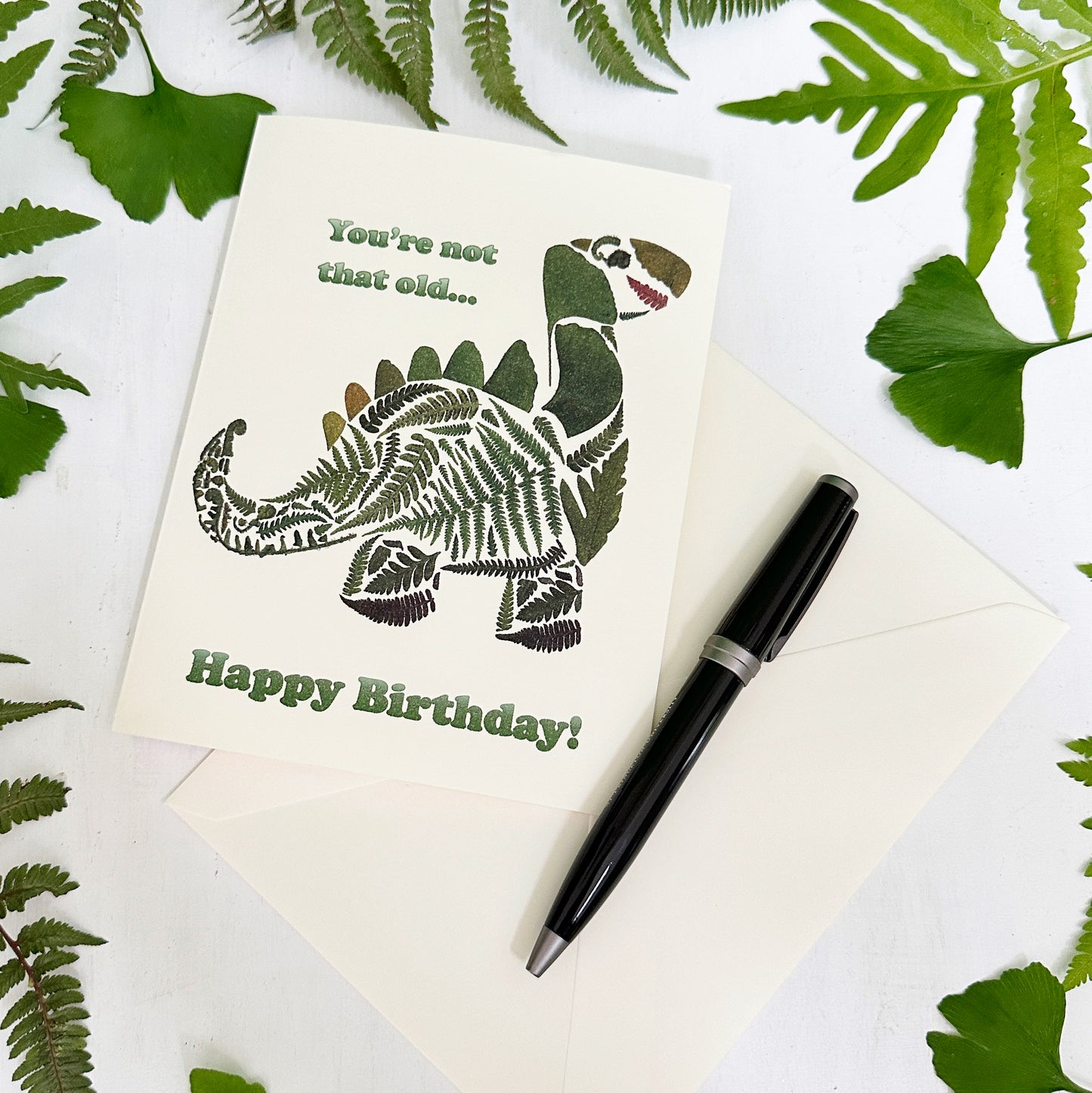 Dinosaur Birthday Card - printed real pressed fern and ginkgo leaves in a dinosaur shape