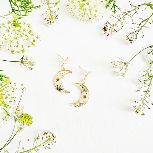 Moon and star earrings with real flowers